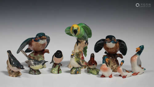Eleven Beswick models of birds, including two Kingfisher, No. 2371, Parakeet, No. 930, and three