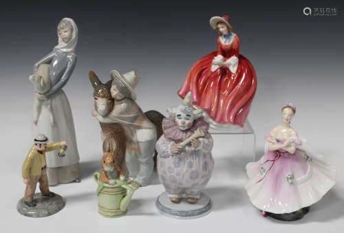 Three Lladro porcelain figures, comprising The Show Begins, model No. 6938, Girl with Lamb, model