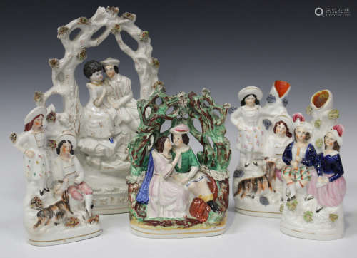 A mixed group of pottery and porcelain figures, late 19th and 20th century, including a