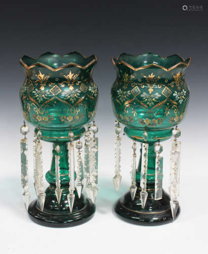 A pair of green glass lustres, late 19th/early 20th century, each bulbous shaped top enamelled and