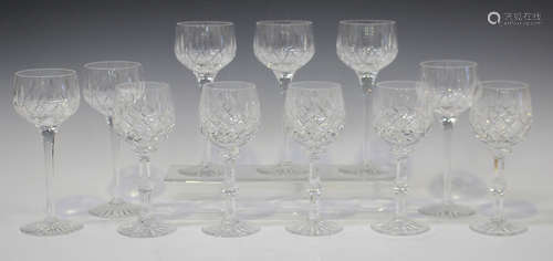 Six Stuart cut hock glasses, the bowls with cross and slice cuts, raised on plain stems and star cut