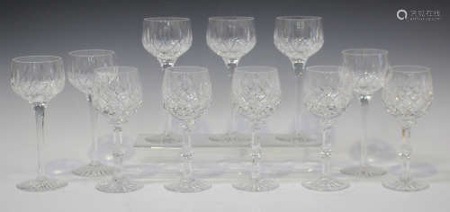 Six Stuart cut hock glasses, the bowls with cross and slice cuts, raised on plain stems and star cut
