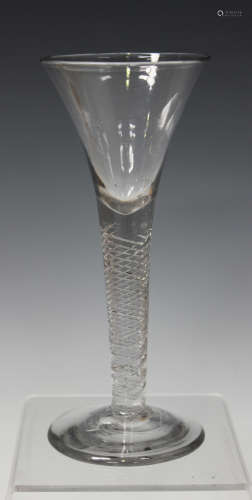 An airtwist stem wine glass, mid-18th century, the drawn trumpet bowl raised on a multi-series