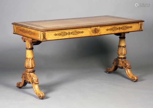 A Regency bird's eye maple and foliate inlaid library table, in the manner of Gillows of