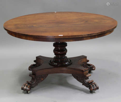 An early Victorian mahogany circular tip-top breakfast table, the turned column above a