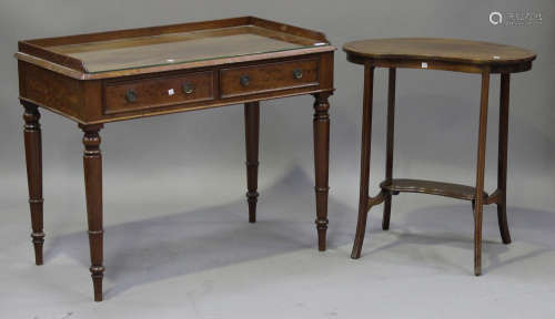 A Victorian mahogany side table, the gallery top above two frieze drawers, raised on turned legs,
