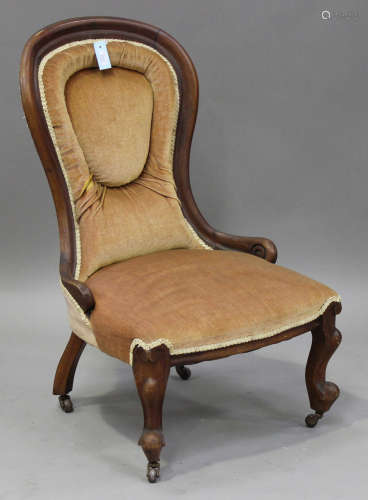 A late Victorian walnut showframe lady's salon chair, upholstered in velour, on cabriole legs,