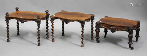 A Regency rosewood three-tier whatnot, in the manner of Gillows of Lancaster, the reeded finials