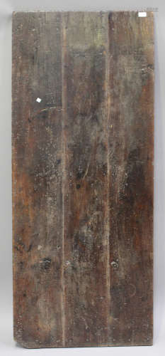 A 19th century stained pine three-plank trestle table top, length 175cm, depth 74cm.Buyer’s
