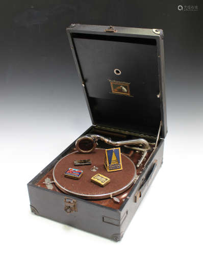 An early 20th century HMV black cased portable gramophone with a No. 4 reproducer, length 41cm,