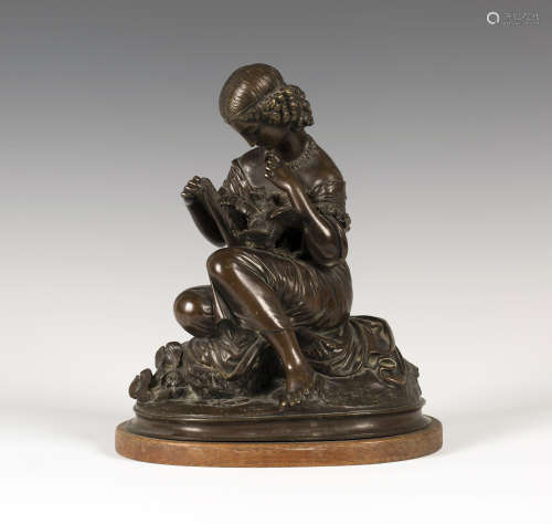 A late 19th century French brown patinated cast bronze figure of a seated classical maiden