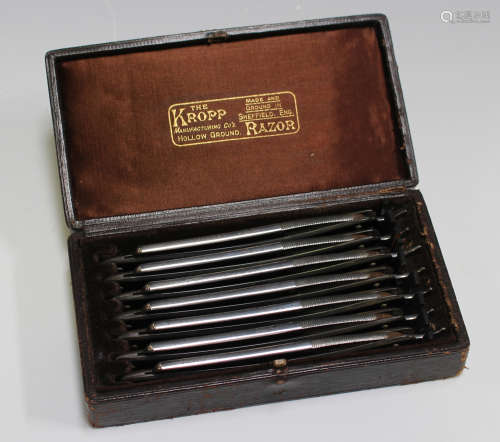 A set of seven early 20th century days-of-the-week cut throat razors by the Kropp Manufacturing