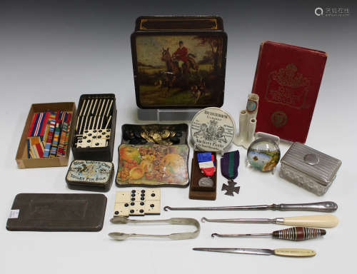 A group of mixed collectors' items, including a Burgess's Anchovy Paste pot lid, a set of bone and
