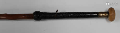 An early 20th century Basque makila walking stick, the engraved brass collar dated 1904 and