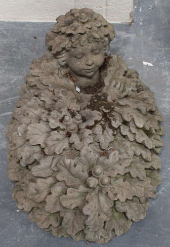 Rachel Bates - a cast composition stone ornament of a boy sleeping in a bed of leaves, length 70cm.