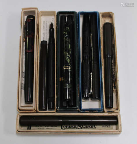 A group of various fountain pens, including two Onoto self-filling pens, a Conway Stewart
