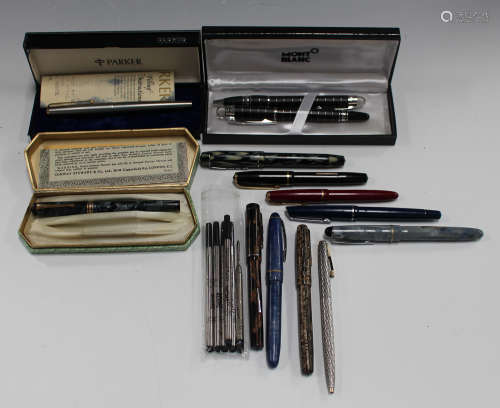 A Montblanc ballpoint pen, a Montblanc propelling action ballpoint pen, a Montblanc case, five