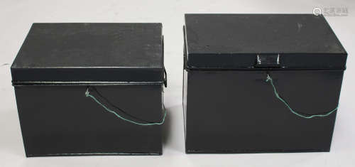 Two late 19th/early 20th century black painted tin trunks, widths 57cm and 60cm (later painted).