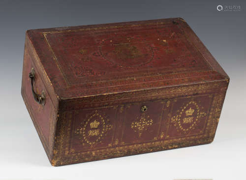 A large Victorian gilt-tooled red leather governmental dispatch box, the hinged lid with central