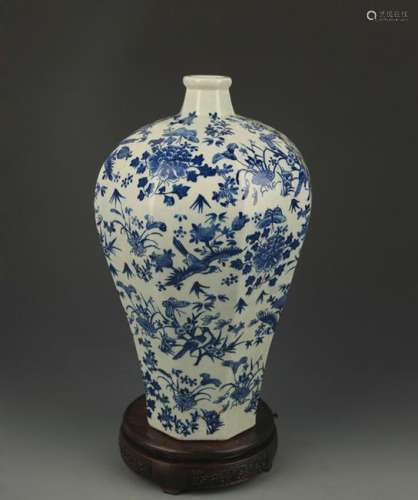 A BLUE AND WHITE, FLOWER AND BIRD PAINTED VASE