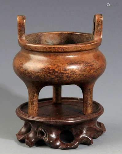 A REAR TRIPOD BRONZE CENSER