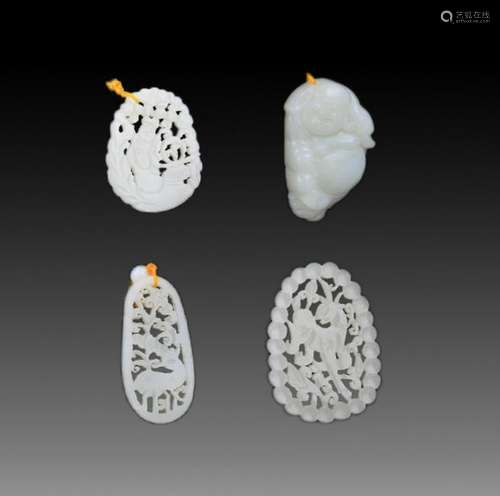 GROUP OF FOUR FINELY CARVED JADE PENDANT