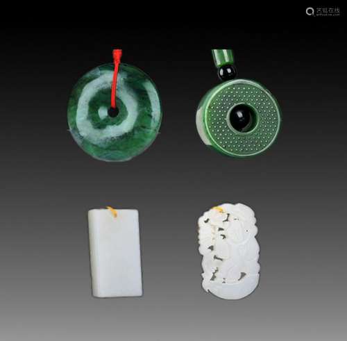 GROUP OF FOUR FINELY CARVED JADE PENDANT