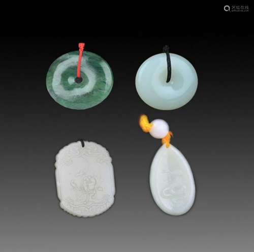 GROUP OF FOUR FINELY CARVED JADE PENDANT