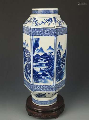 A BLUE AND WHITE LANDSCAPE HEXAGONAL SHAPE VASE