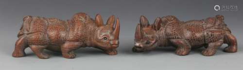 PAIR OF FINELY CARVED RHINOCEROS FIGURE