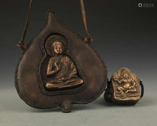 PAIR OF COWHIDE WITH BRONZE TIBETAN BUDDHISM PENDANT