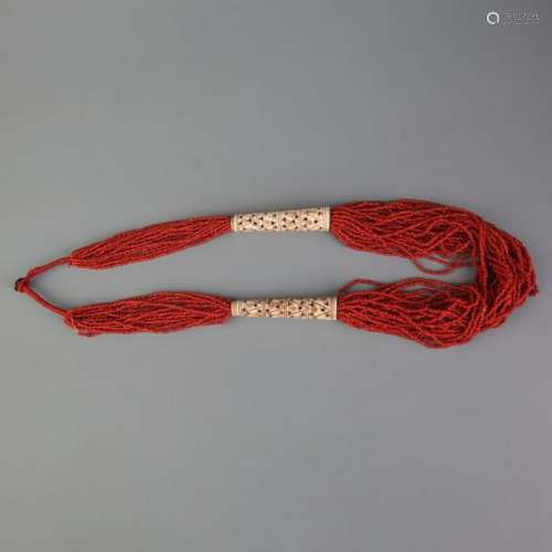 A FINE CORAL AND OX BONE NECKLACE