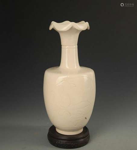 A DING KILN LOTUS PATTERN FLOWER TOP VASE