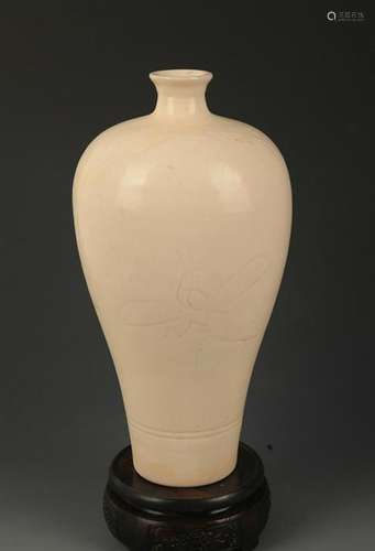 A DING KILN LOTUS CARVING MEI VASE