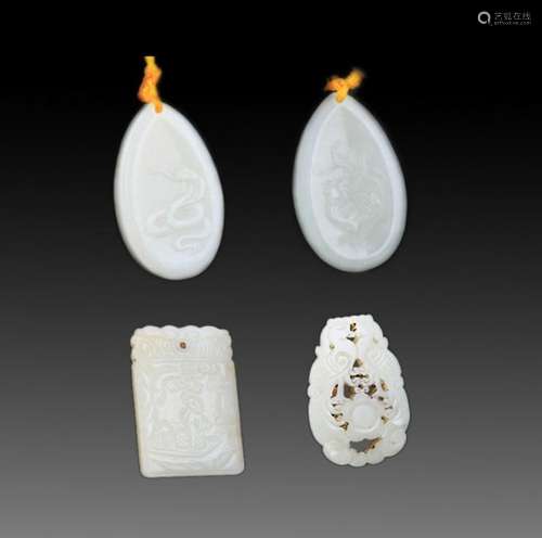 GROUP OF FOUR FINELY CARVED JADE PENDANT