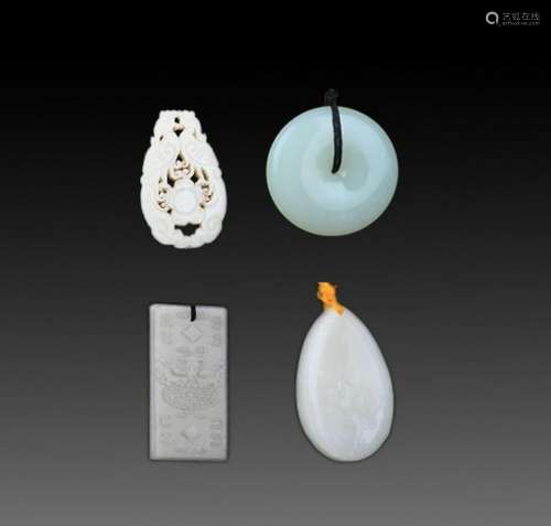 GROUP OF FOUR FINELY CARVED JADE PENDANT