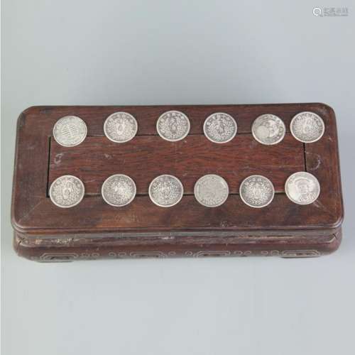 GROUP OF TWELVE SMALL CHINESE COIN