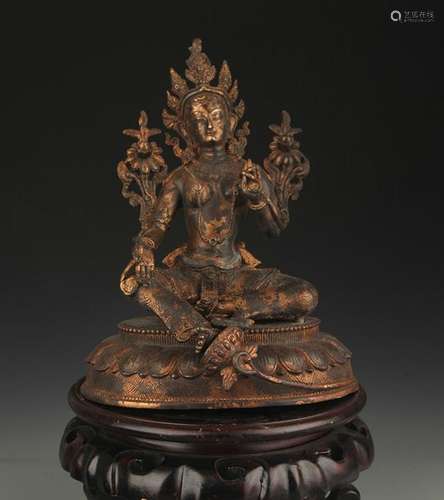 A BRONZE GREEN TARA STATUE