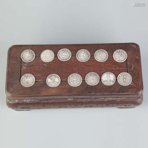 GROUP OF TWELVE SMALL CHINESE COIN