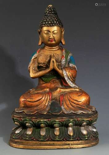 A FINE COLORED BRONZE AKSHOBHYAA BUDDHA