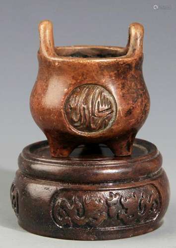 A FINELY CARVED SMALL BRONZE CENSER