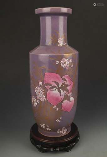 A PURPLE GROUND FAMILLE ROSE PEACH VASE