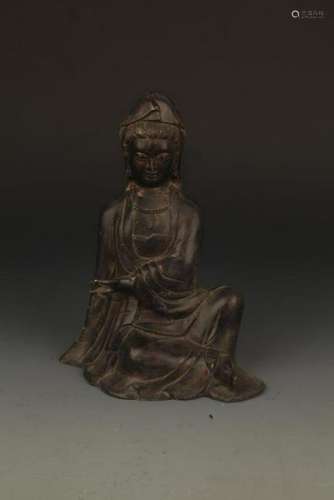 A FINELY CARVED BRONZE SEATED 