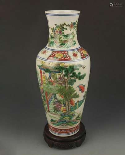 A FAMILLE VERTE STORY PAINTED GUAN YIN VASE