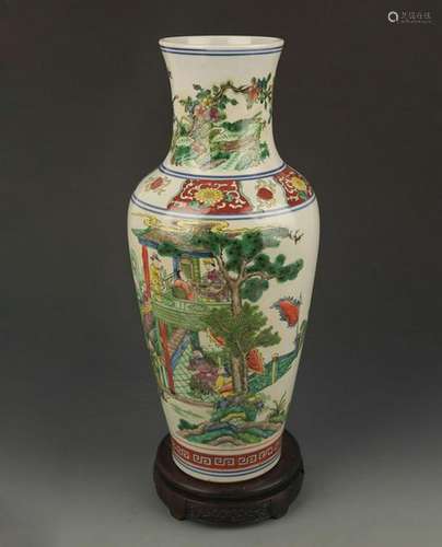 A FAMILLE VERTE STORY PAINTED GUAN YIN VASE