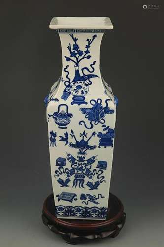 A TALL BLUE AND WHITE SQUARE VASE