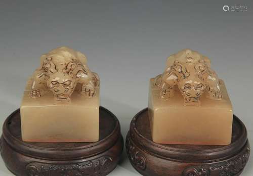 PAIR OF SOAPSTONE LION TOP SEAL