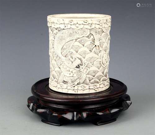 A WHITE COLOR GLAZED PORCELAIN BRUSH HOLDER