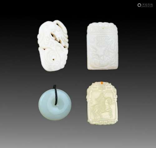 GROUP OF FOUR FINELY CARVED JADE PENDANT