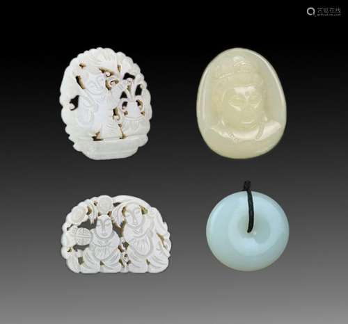 GROUP OF FOUR FINELY CARVED JADE PENDANT